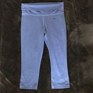 Dark blue striped Nike yoga crop pants